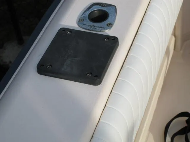 Slide: The Image of 2005 Grady-White 282 Sailfish boat detail showing deck fittings and padded seating. - 15