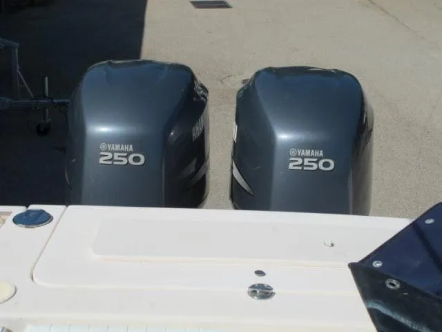 Slide: The Image of Twin Yamaha 250 engines on a 2005 Grady-White 282 Sailfish boat. - 20