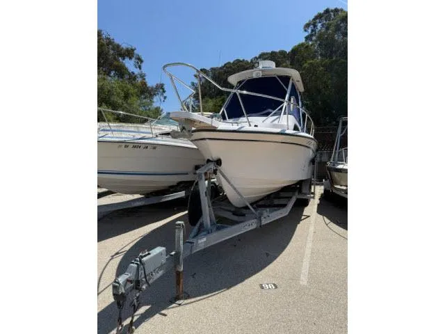 Slide: The Image of 2005 Grady-White 282 Sailfish boat on trailer in parking lot. - 25