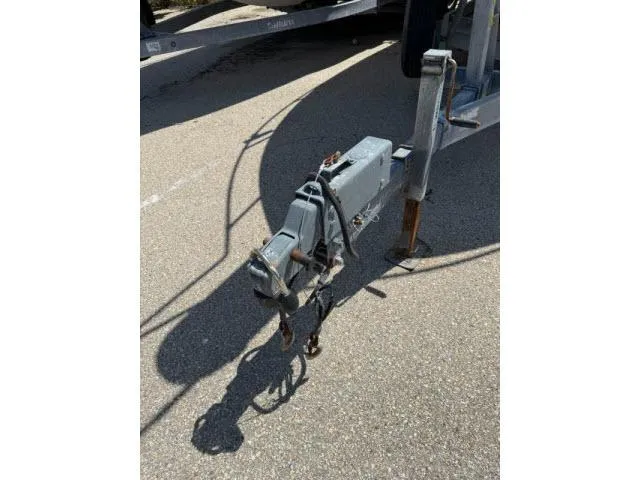 Slide: The Image of Trailer hitch of a 2005 Grady-White 282 Sailfish boat on pavement. - 27
