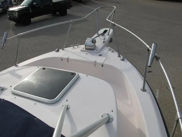 Slide: The Image of 2005 Grady-White 282 Sailfish boat deck with railing and hatch. - 3