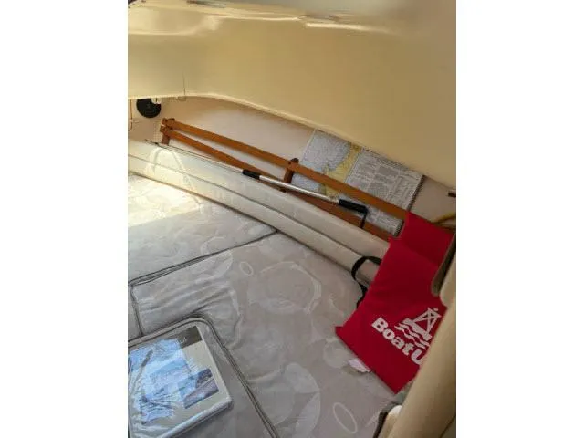 Slide: The Image of Interior cabin of 2005 Grady-White 282 Sailfish boat with map and red bag. - 35