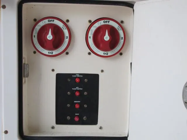 Slide: The Image of Control panel of a 2005 Grady-White 282 Sailfish boat with dual battery switches. - 45