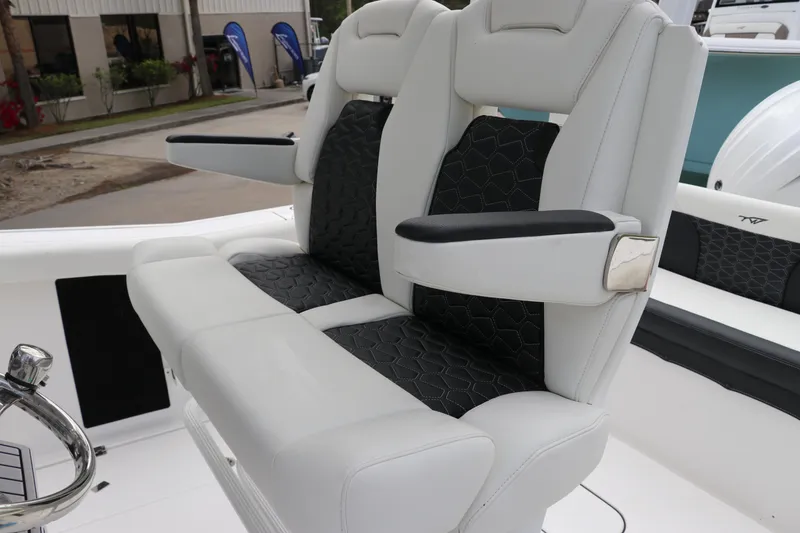 Slide: The Image of 2024 Tidewater 256 LXF boat speakers and lighting on the overhead console. - 17