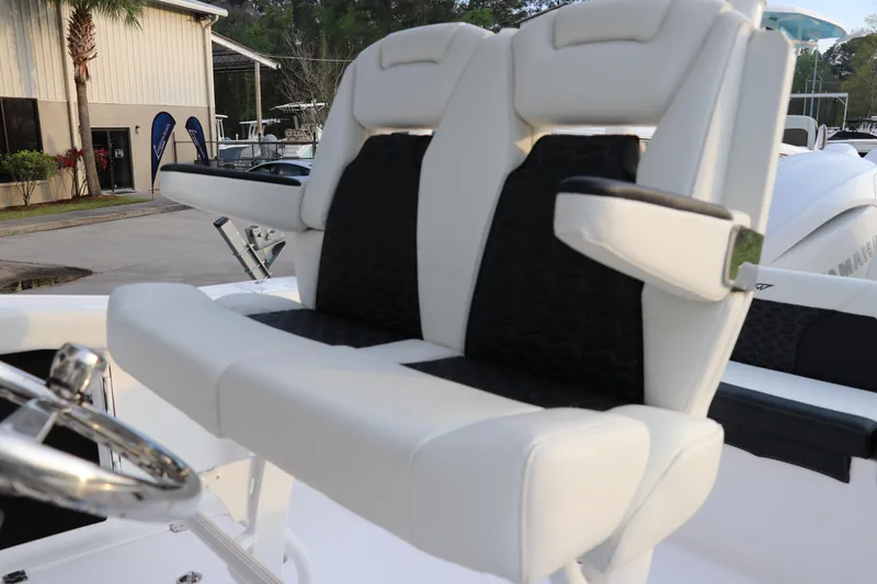 Slide: The Image of 2024 Tidewater 256 LXF boat seats with armrests, showcasing luxury and comfort. - 20