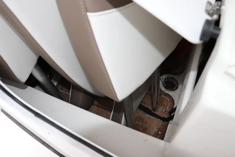 Slide: The Image of 2024 Tidewater 2500 Carolina Bay interior detail with seating and storage area. - 15