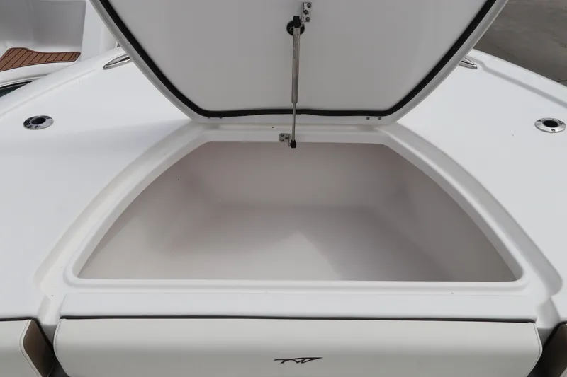 Slide: The Image of Open storage compartment on 2024 Tidewater 2500 Carolina Bay boat. - 25