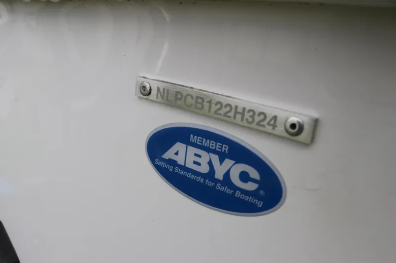 Slide: The Image of 2024 Tidewater 2500 Carolina Bay boat with ABYC member plaque and serial number. - 27