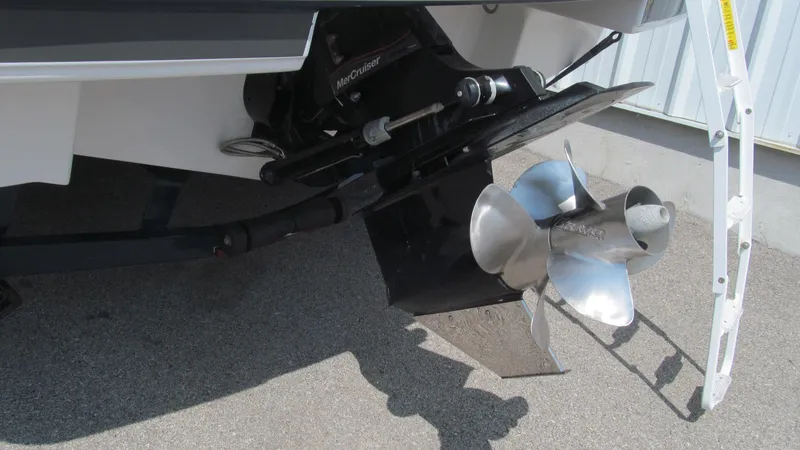 Slide: The Image of 2017 Four Winns HD220 boat propeller and outdrive detail. - 15