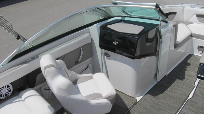 Slide: The Image of 2017 Four Winns HD220 boat interior with white seating and sleek design. - 7