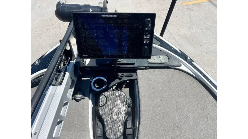 Slide: The Image of 2017 Nitro Z19 boat dashboard with Humminbird fish finder and foot pedal controls. - 11