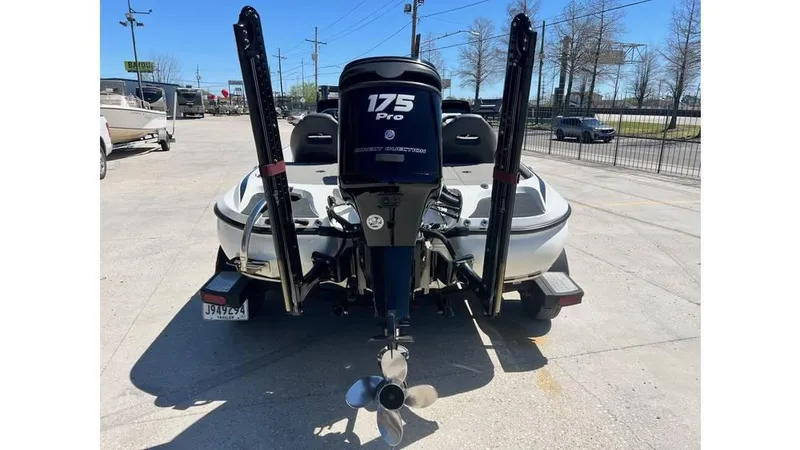 Slide: The Image of 2017 Nitro Z19 boat with 175 Pro motor, parked in a lot. - 4