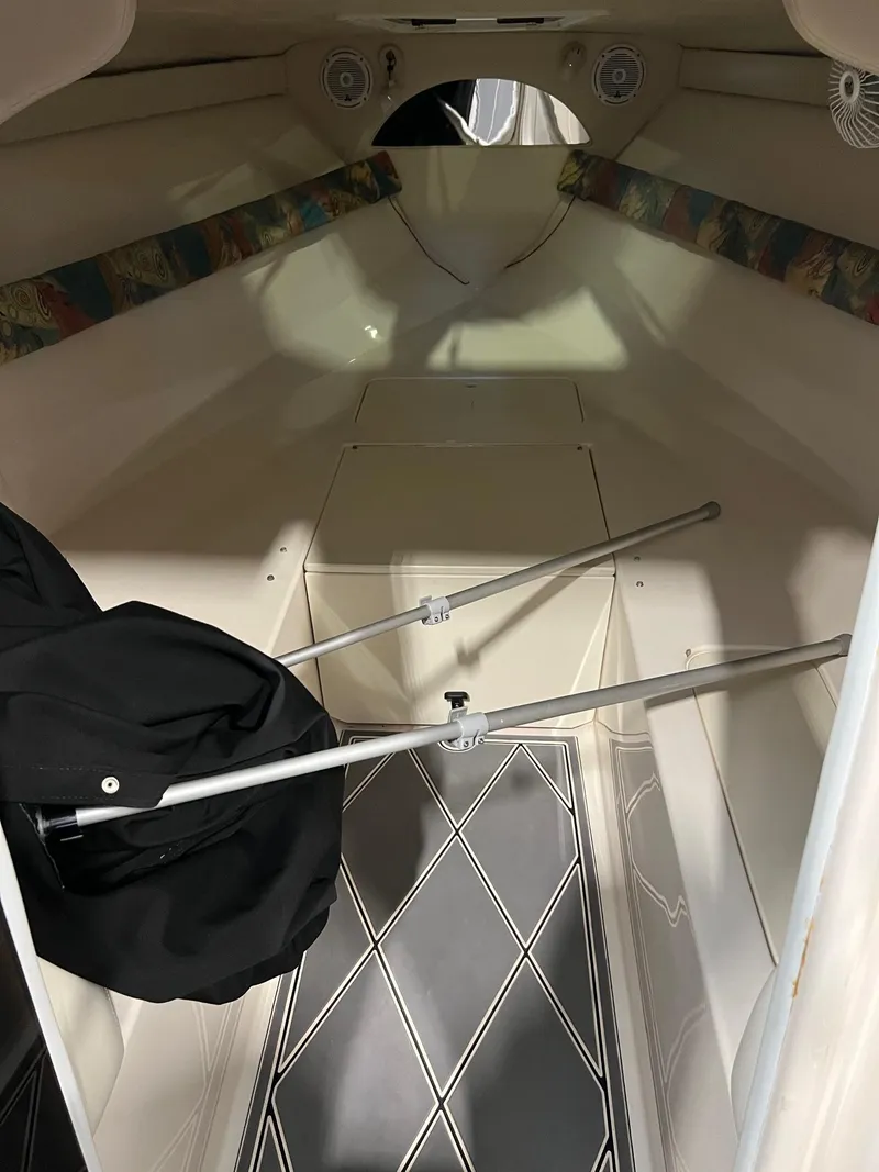 Slide: The Image of Interior of a 1997 Donzi 27 ZX boat, featuring a sleek cabin design. - 13