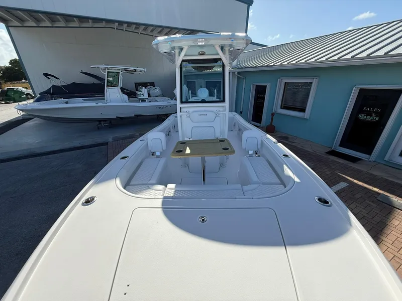 Slide: The Image of 2024 Caymas 26 HB boat with spacious deck and modern design. - 25