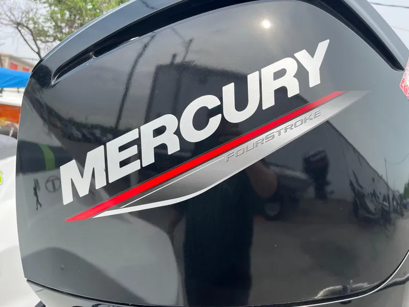 Slide: The Image of Mercury FourStroke engine on a 2021 Tahoe T16 boat, close-up view. - 8