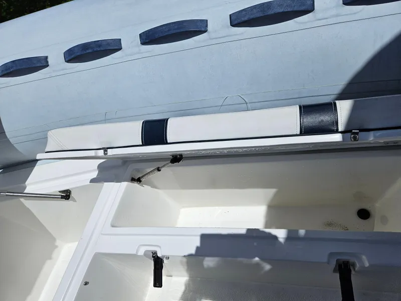 Slide: The Image of 2020 AB Inflatables Oceanus 24VST boat interior with storage compartments. - 12