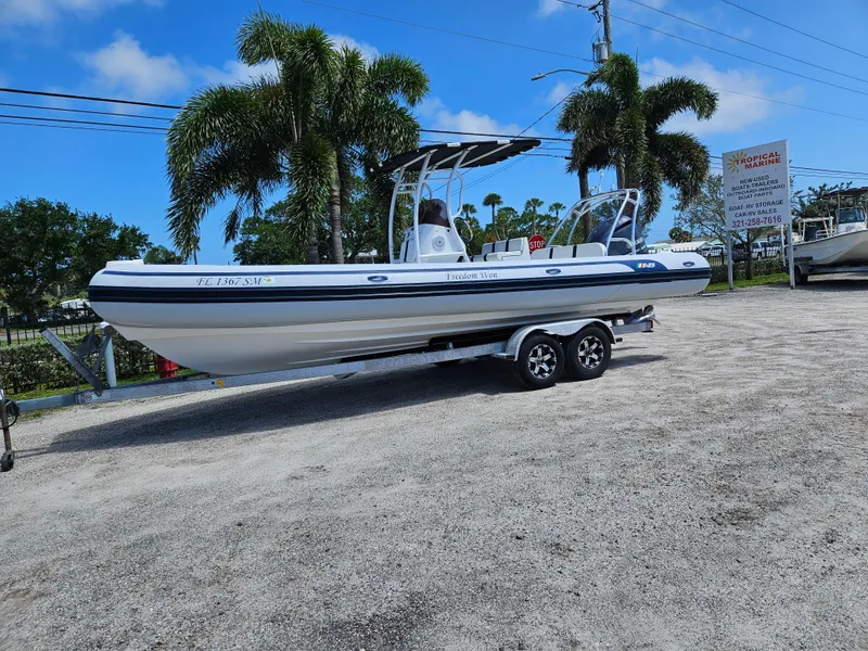 Slide: The Image of 2020 AB Inflatables Oceanus 24VST boat, featuring a sleek console and spacious deck. - 2