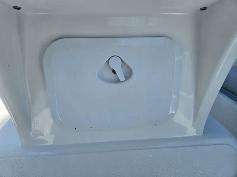 Slide: The Image of 2020 AB Inflatables Oceanus 24VST storage compartment with a secure latch. - 22