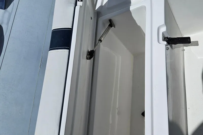 Slide: The Image of 2020 AB Inflatables Oceanus 24VST boat on trailer under clear blue sky. - 6