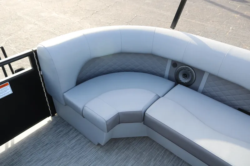 Slide: The Image of Luxurious seating on 2021 Bennington L22 pontoon boat with quilted upholstery and speaker. - 22