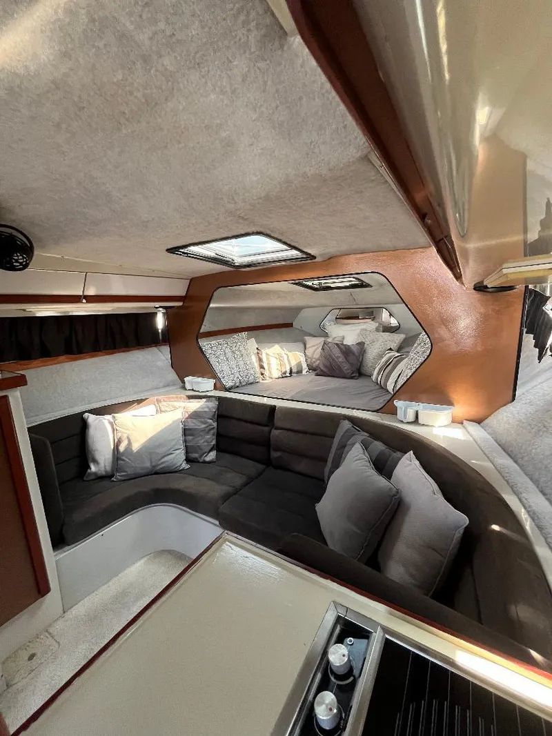 Slide: The Image of Interior of 1988 Carver 2767 Santego yacht with cozy seating and modern design. - 15