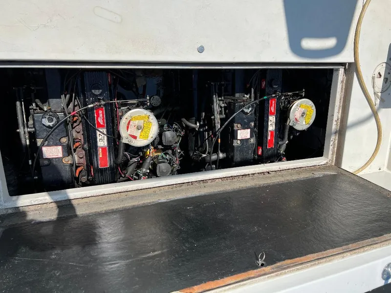 Slide: The Image of Engine compartment of a 1988 Carver 2767 Santego boat, showing mechanical components. - 30