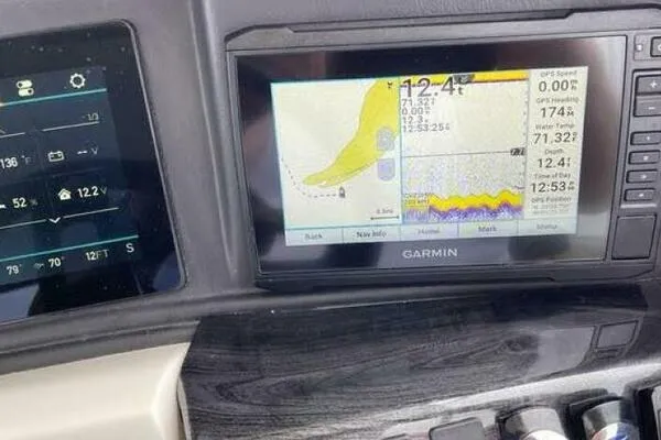 Slide: The Image of Garmin navigation display on 2022 Avalon Catalina Platinum Quad Lounger boat dashboard. - 6