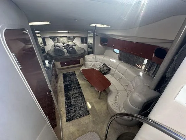 Slide: The Image of Luxurious interior of a 2004 Formula 37PC yacht with plush seating and modern design. - 2