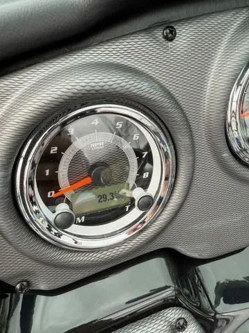 Slide: The Image of 2015 Yamaha Boats 212X on trailer, parked outdoors, showcasing sleek design and high output features. - 5