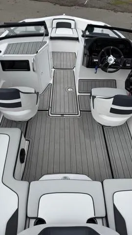 Slide: The Image of 2023 Yamaha Boats 195S interior with sleek seating and modern dashboard design. - 4