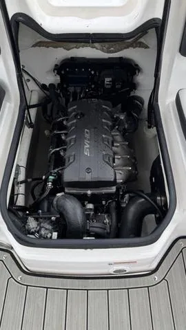 Slide: The Image of 2023 Yamaha Boats 195S engine compartment, showcasing powerful marine engine design. - 7