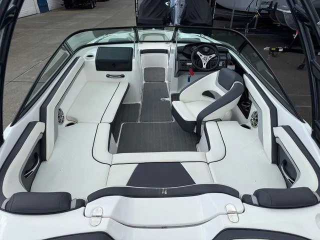 Slide: The Image of 2016 Yamaha Boats AR192 interior with white seating and speaker. - 7