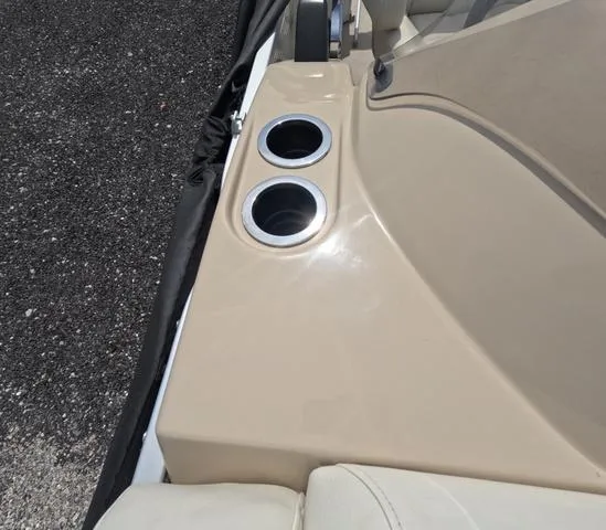 Slide: The Image of 2018 Sweetwater SW 2086 C boat interior with dual cup holders. - 47