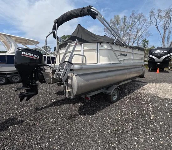 Slide: The Image of 2018 Sweetwater SW 2086 C pontoon boat with Suzuki motor on trailer. - 9