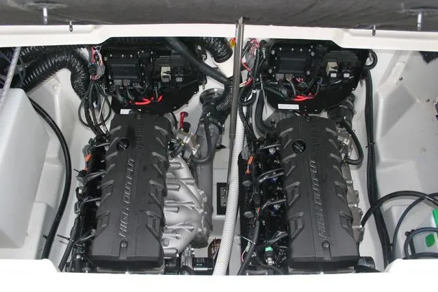 Slide: The Image of 2022 Yamaha Boats 252SD engine compartment with dual high-output engines. - 11