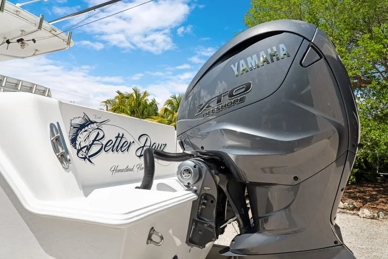 Slide: The Image of 2024 Contender 35 ST boat with Yamaha XTO Offshore engine, "Better Dayz" name visible. - 10