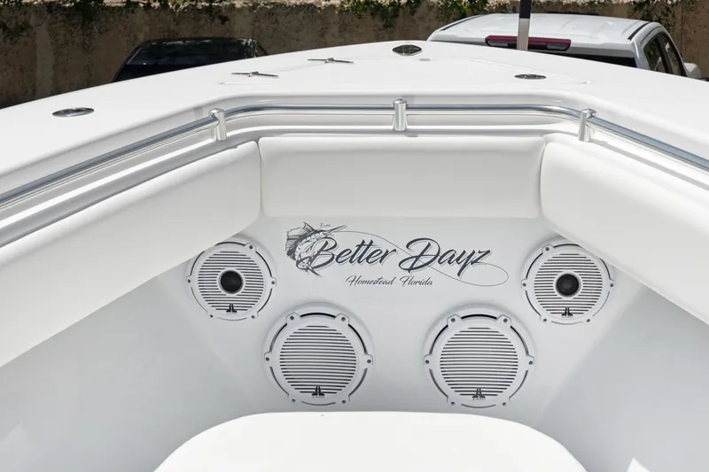Slide: The Image of 2024 Contender 35 ST boat interior with "Better Dayz" logo and multiple speakers. - 23