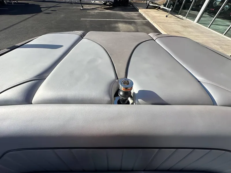 Slide: The Image of 2025 Sanger V215 SX boat interior with sleek gray upholstery design. - 15