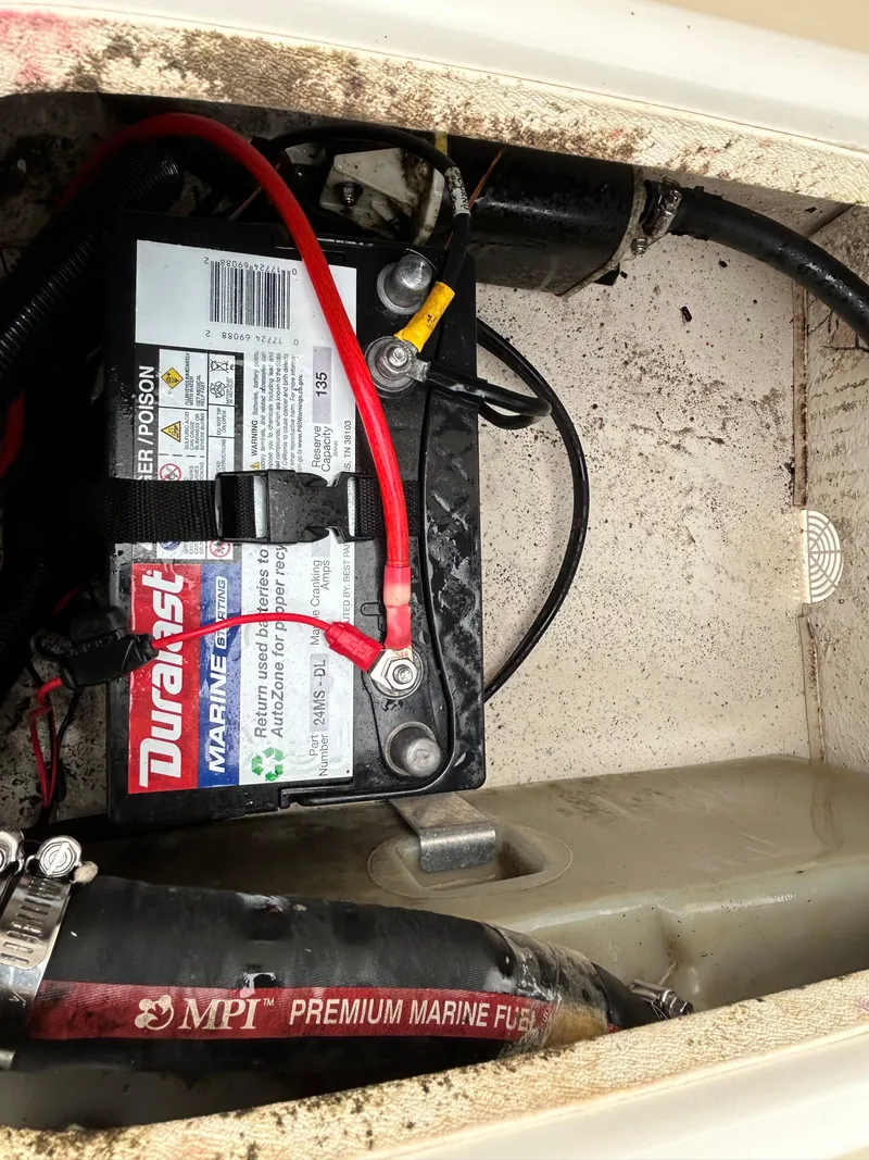 Slide: The Image of 2017 Carolina Skiff JVX Pre-Rig Series 18 marine battery and fuel line setup. - 19