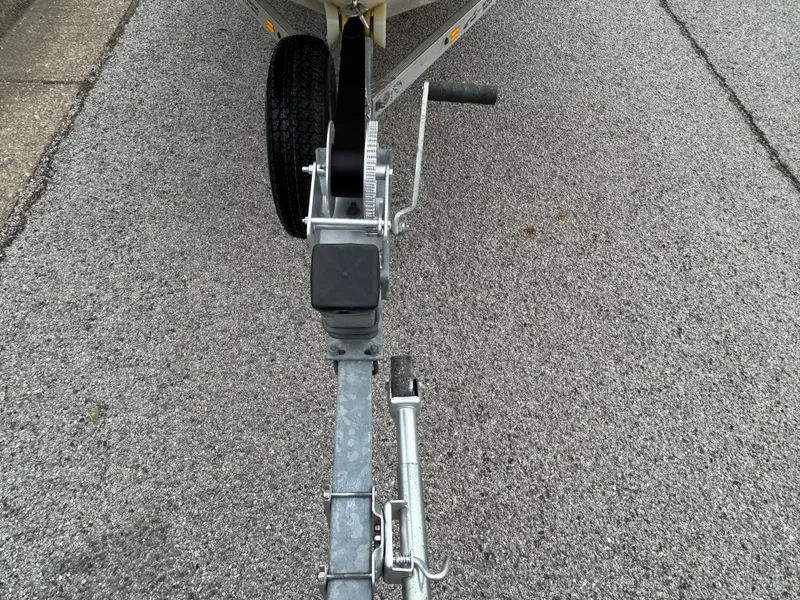 Slide: The Image of Trailer hitch of a 2017 Carolina Skiff JVX Pre-Rig Series 18 on pavement. - 26