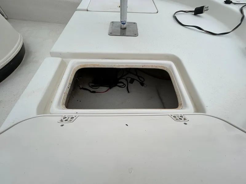 Slide: The Image of Open storage compartment on 2017 Carolina Skiff JVX Pre-Rig Series 18 boat. - 29