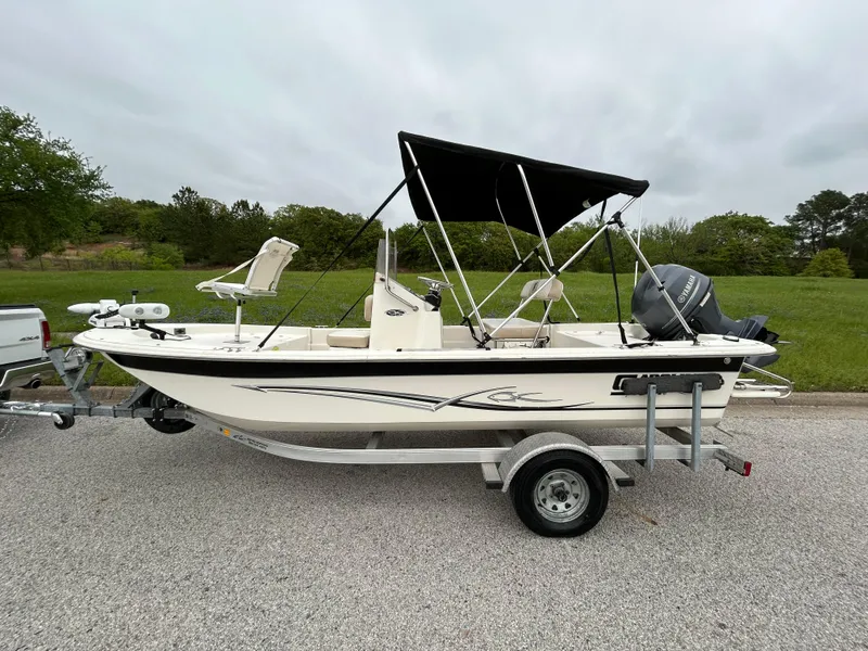 Slide: The Image of 2017 Carolina Skiff JVX Pre-Rig Series 18 boat on trailer, parked outdoors. - 3