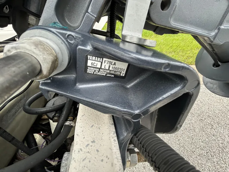 Slide: The Image of Close-up of a Yamaha F70LA motor part on a 2017 Carolina Skiff JVX Pre-Rig Series 18. - 32