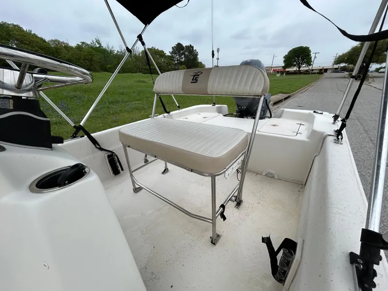 Slide: The Image of 2017 Carolina Skiff JVX Pre-Rig Series 18 boat interior with seating and steering console. - 37