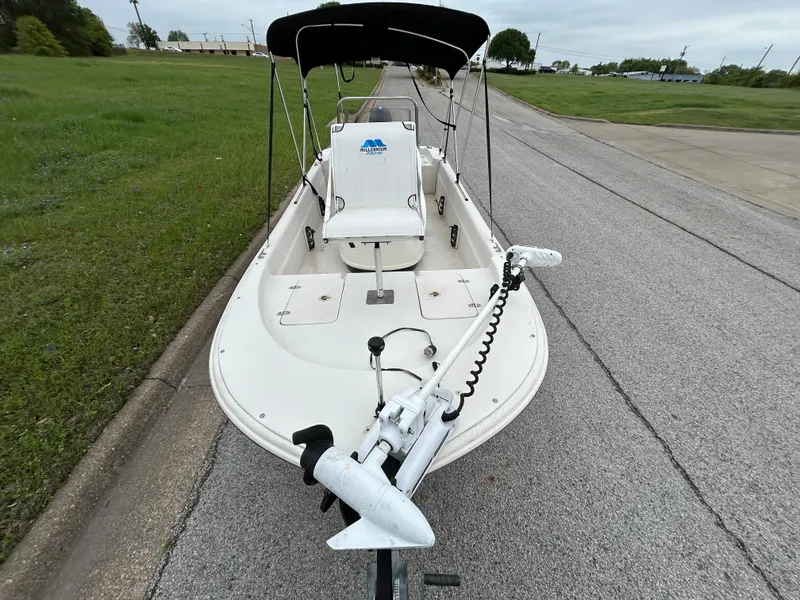 Slide: The Image of 2017 Carolina Skiff JVX Pre-Rig Series 18 boat on a road, front view. - 40