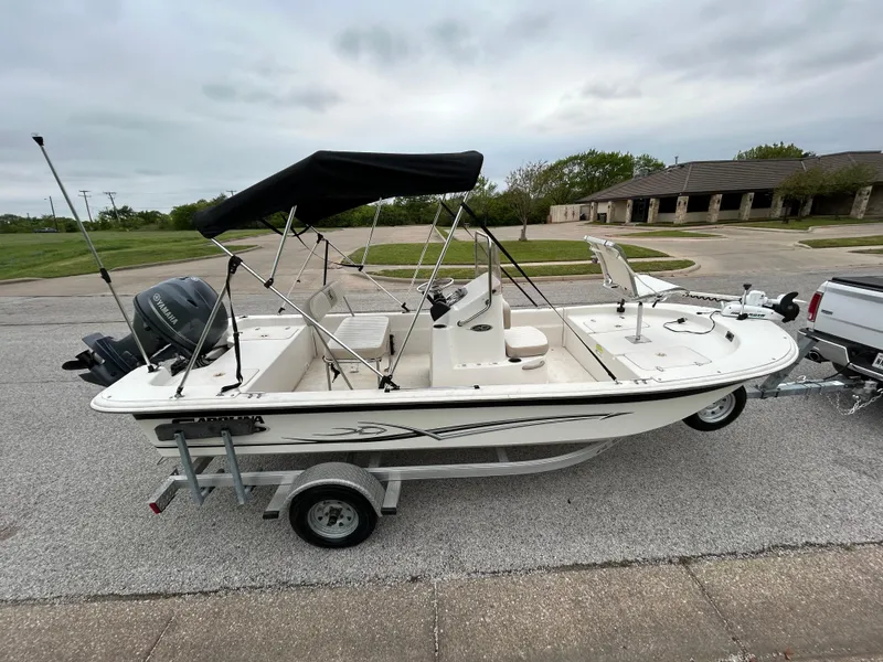 Slide: The Image of 2017 Carolina Skiff JVX Pre-Rig Series 18 boat on trailer, parked outdoors. - 44
