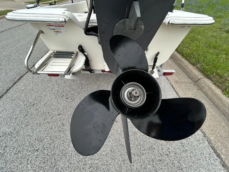 Slide: The Image of 2017 Carolina Skiff JVX Pre-Rig Series 18 boat propeller on a trailer. - 7
