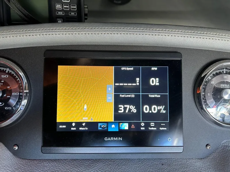 Slide: The Image of Garmin display on 2013 Regal 2700 Bowrider showing GPS, fuel level, and RPM. - 28