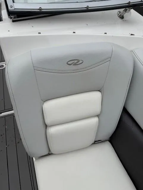 Slide: The Image of 2013 Regal 2700 Bowrider seat with gray and white upholstery. - 36