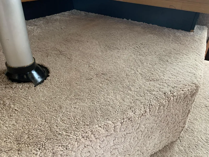 Slide: The Image of Carpeted interior step on a 2000 Bayliner 3988 boat. - 13